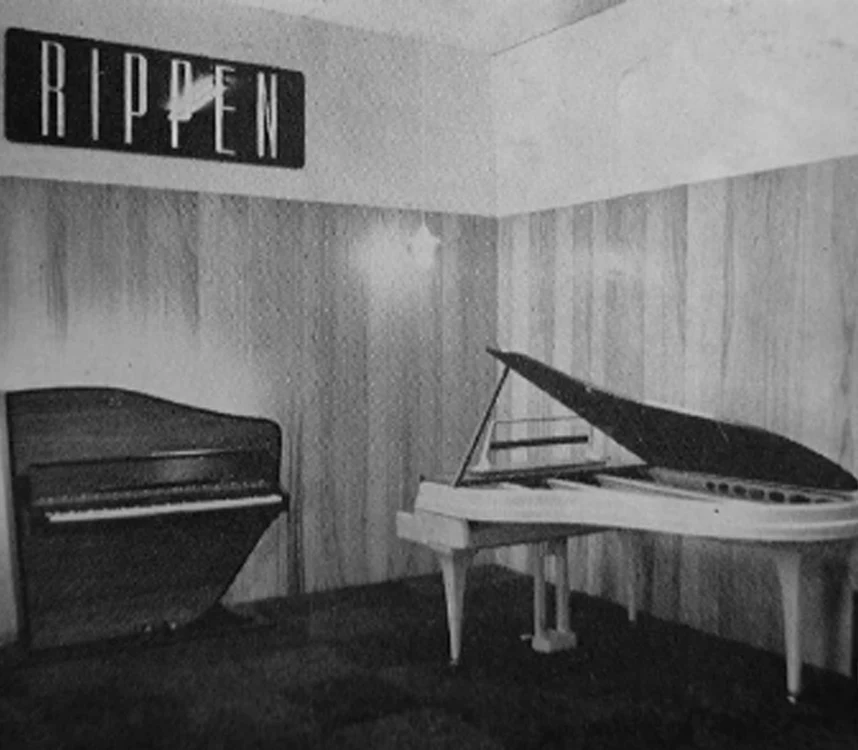 Black-and-white archive photograph of an upright and grand piano below a RIPPEN sign